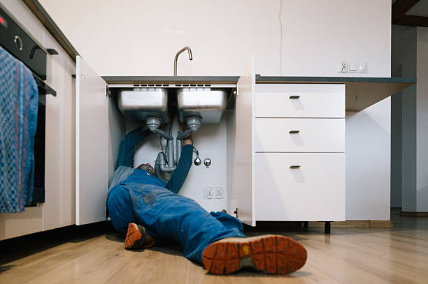 Professional Drain Cleaning technician working in Oakhurst, OK